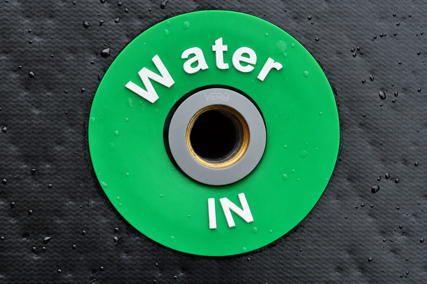 The water inlet connector built into the ice bath, before the Drain Valve is fitted