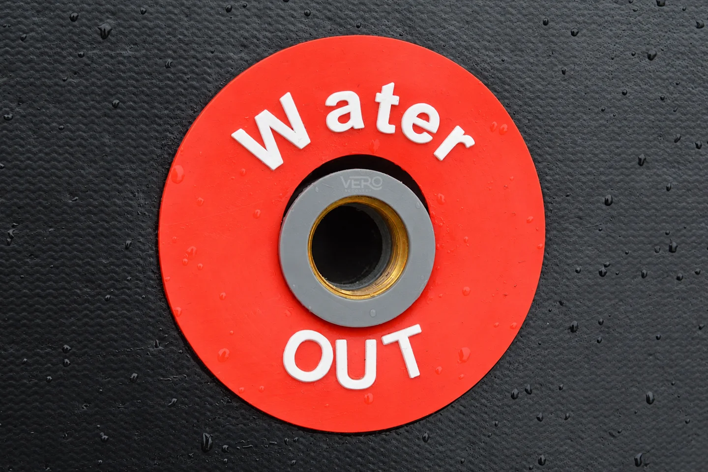 The water outlet connector built into the ice bath, before the Drain Valve is fitted