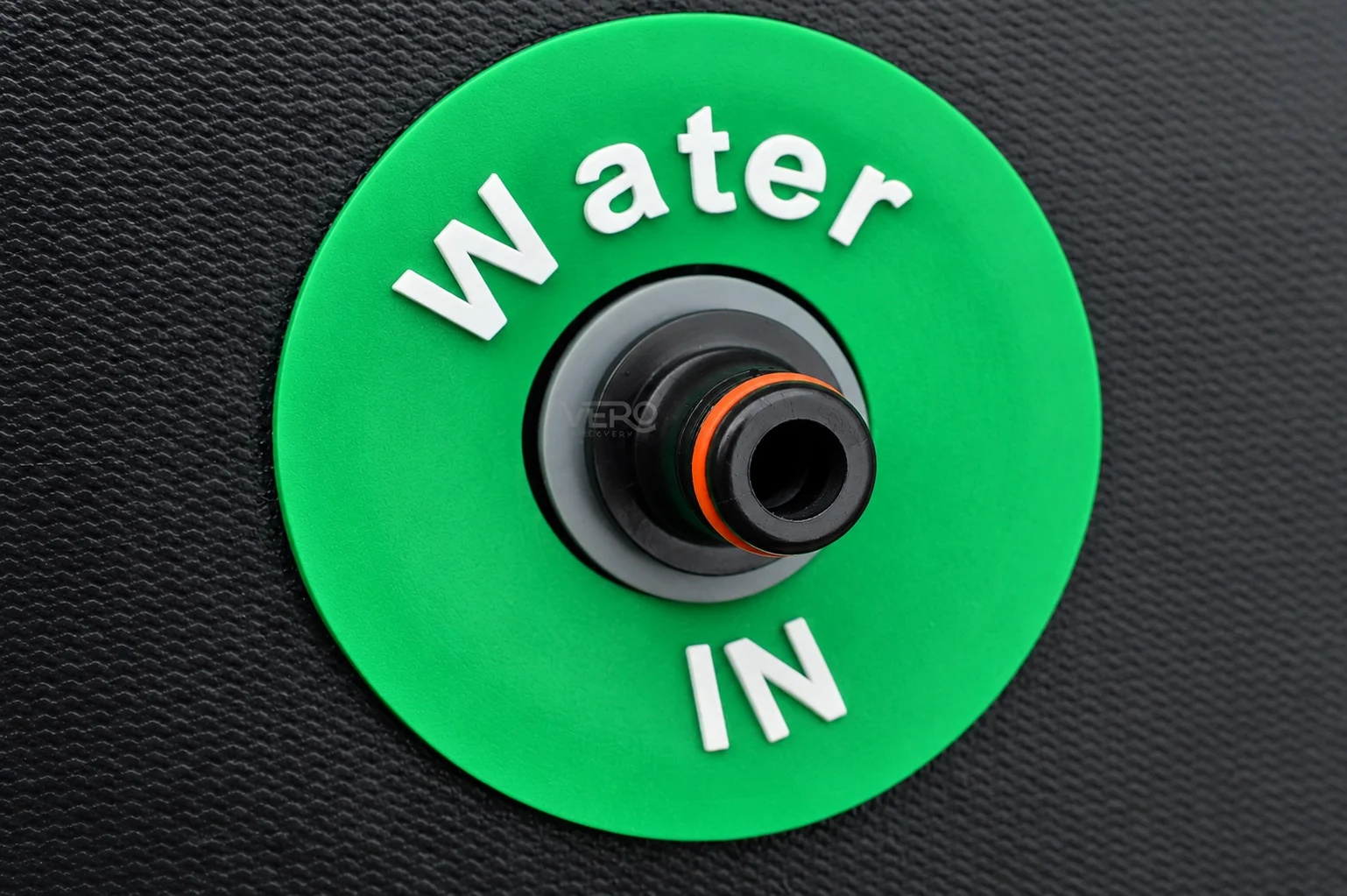 Vero Recovery Ice Bath Hose Connector fitted to an ice bath's water inlet panel