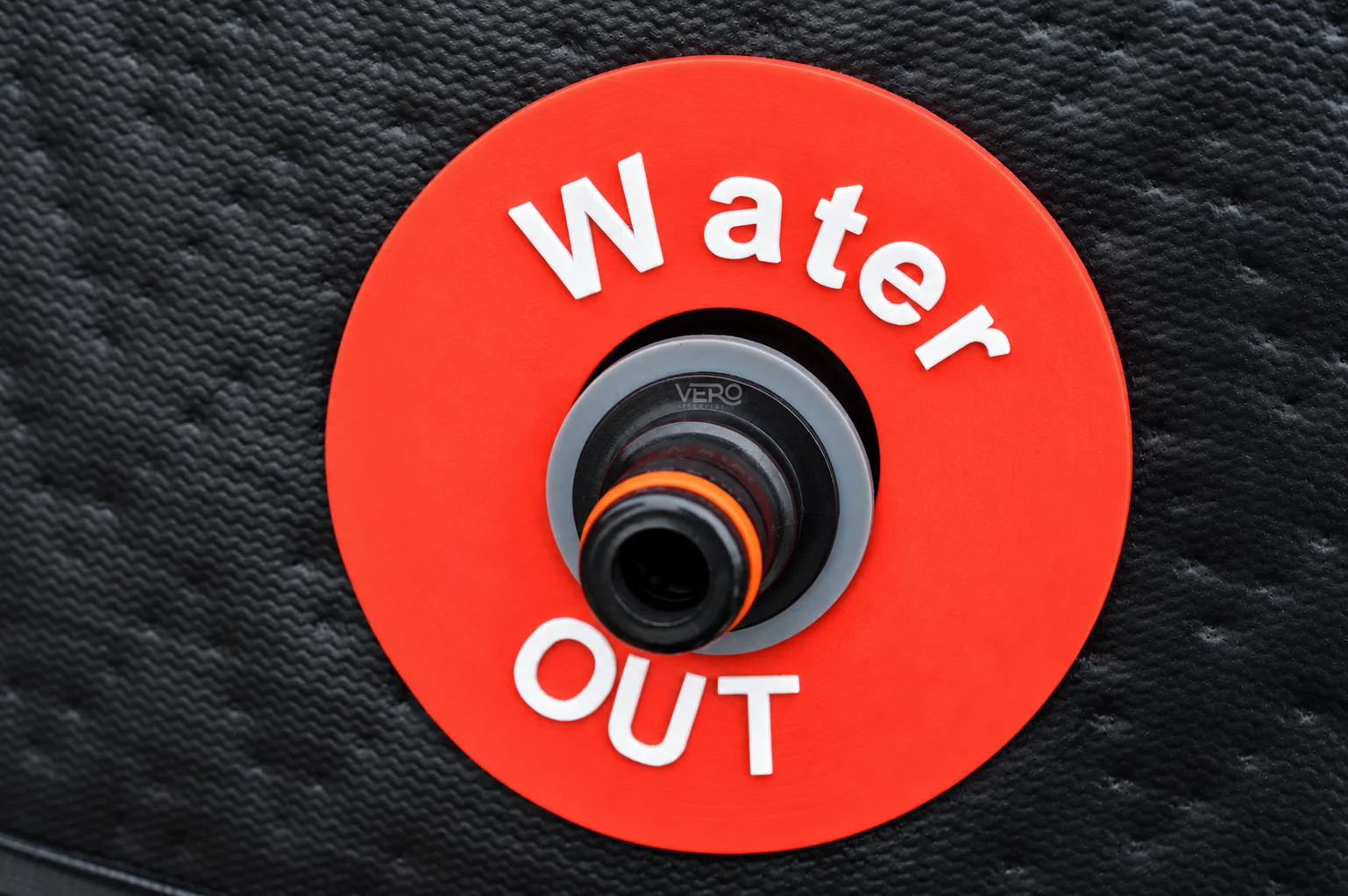 Vero Recovery Ice Bath Hose Connector fitted to an ice bath's water outlet panel